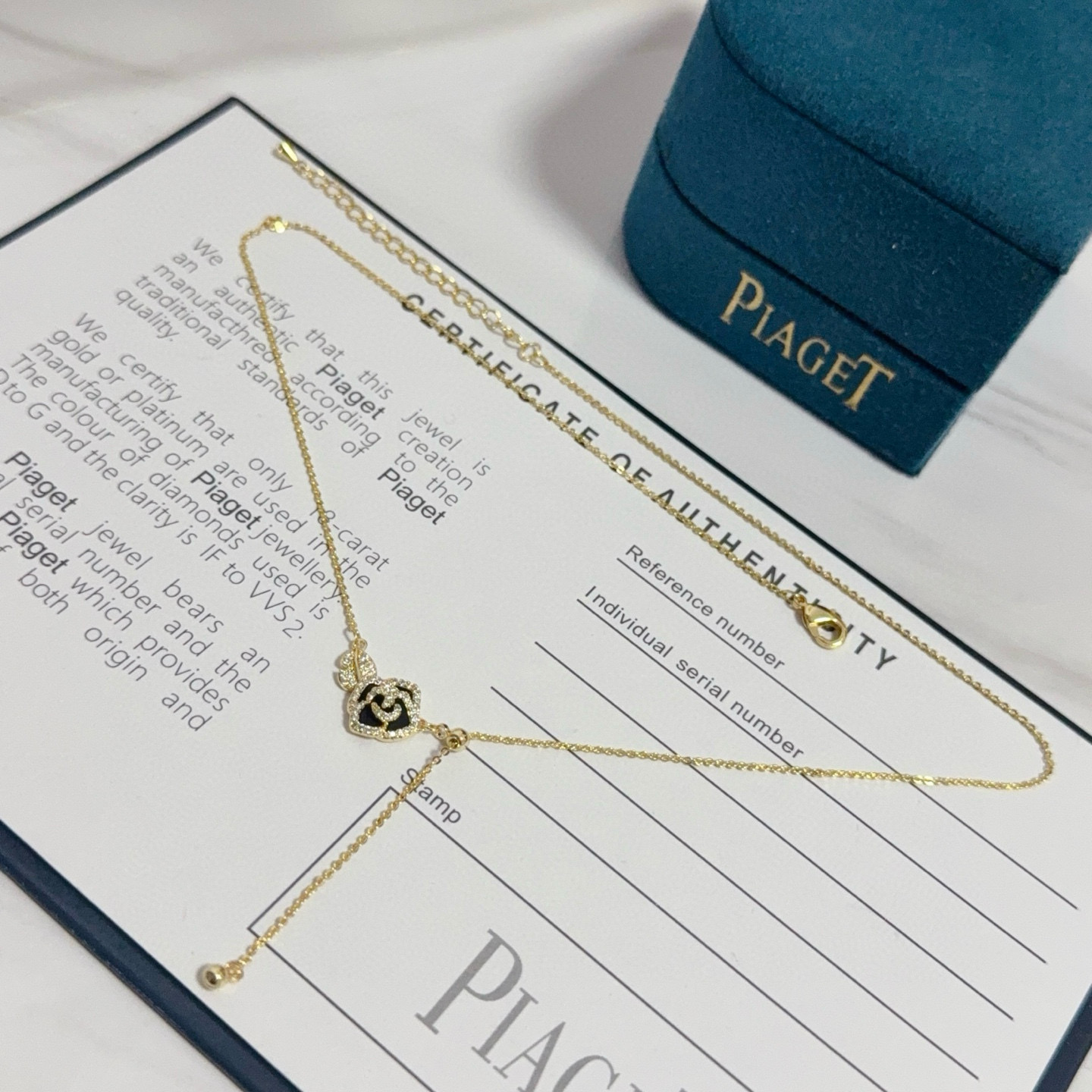 Piaget Rose necklace yellow gold with black enamel and clear diamond accents 45cm