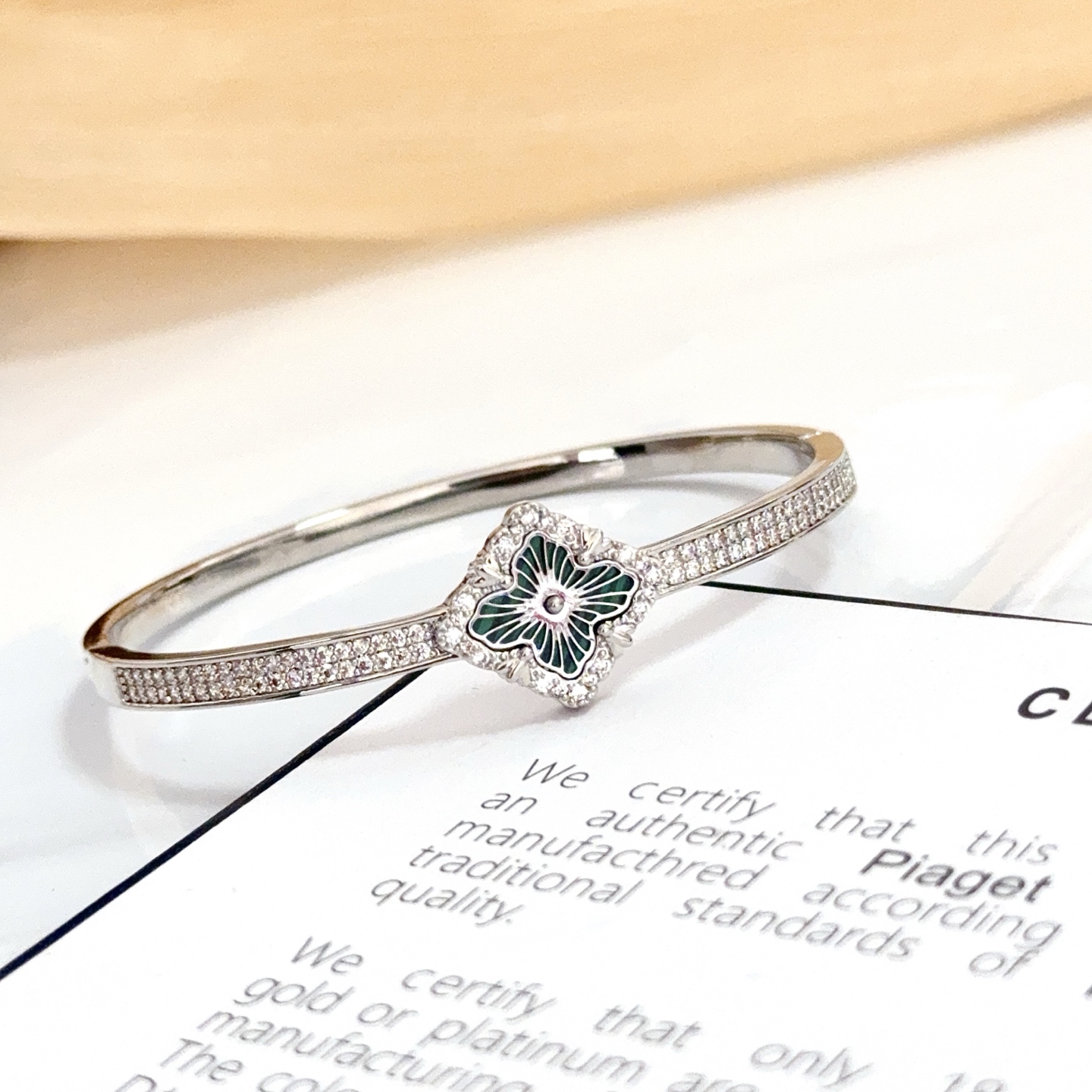 Piaget Rose bracelet silver-toned white gold with clear pave diamonds and dark green malachite floral inlay 17cm