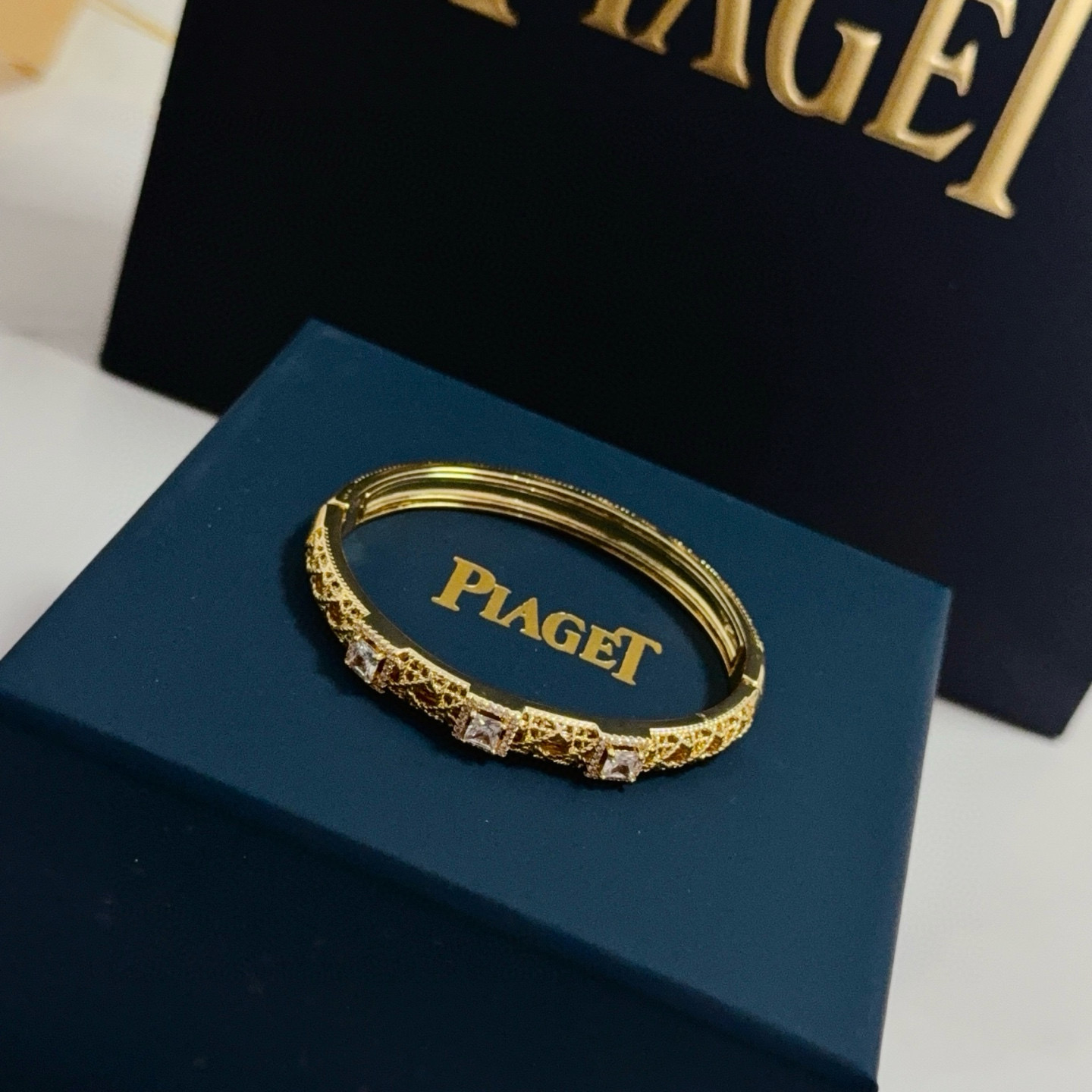 Piaget Sunlight Escape bracelet yellow gold with clear princess-cut gemstones and pave diamond accents 17cm inner circumference