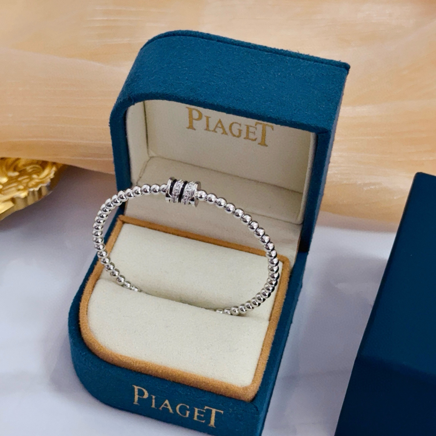 Piaget Possession bracelet silver-toned white gold with clear diamond accents and black enamel detailing 17cm