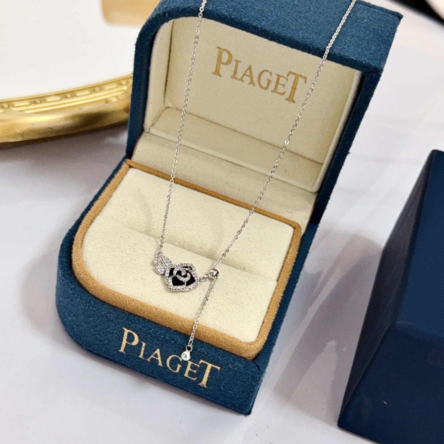 Piaget Rose necklace silver-toned white gold with clear diamond accents and black enamel 42cm adjustable