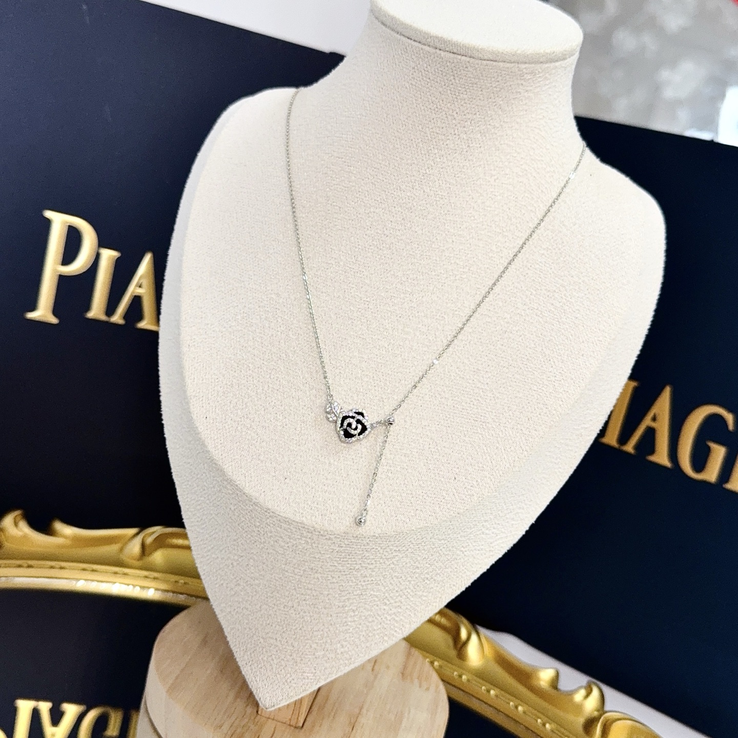 Piaget Rose necklace silver-toned white gold with clear diamond accents and black enamel 42cm adjustable