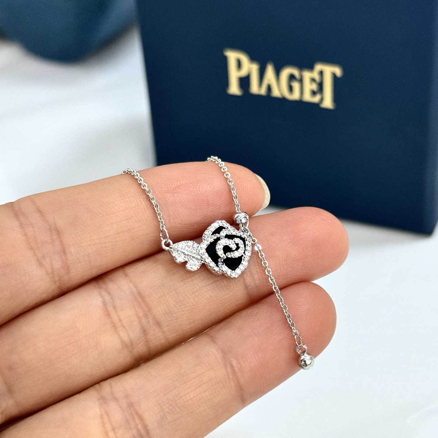 Piaget Rose necklace silver-toned white gold with clear diamond accents and black enamel 42cm adjustable
