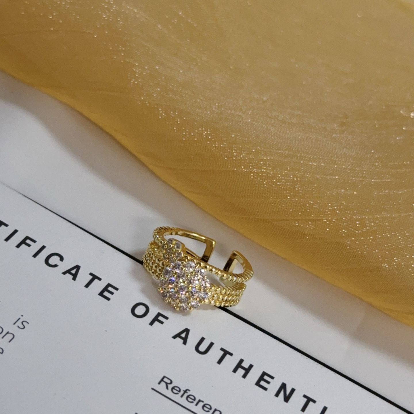 Piaget Possession ring yellow gold with clear pave diamonds adjustable open band