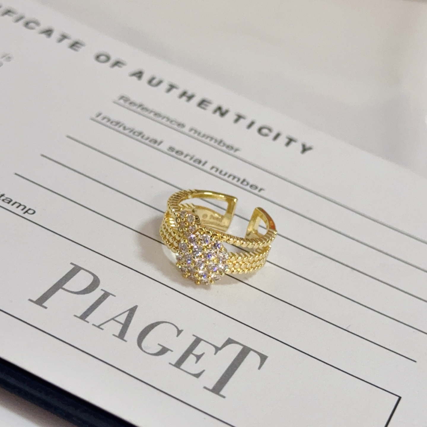 Piaget Possession ring yellow gold with clear pave diamonds adjustable open band