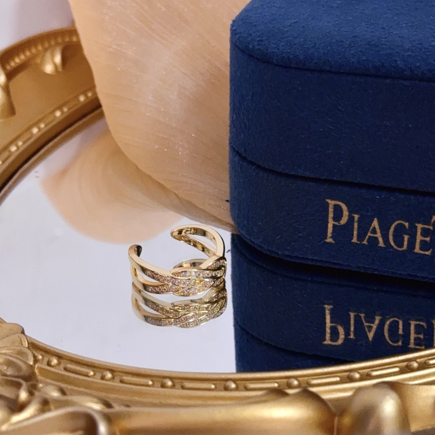 Piaget Possession Knot ring yellow gold with clear diamond accents adjustable open band