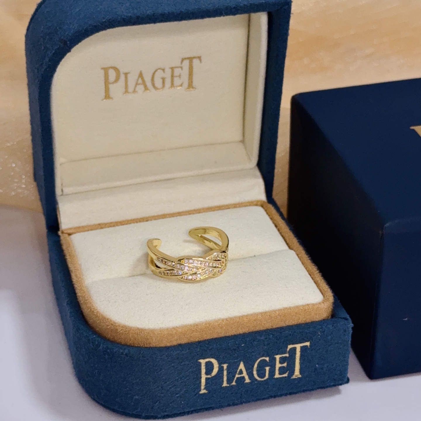 Piaget Possession Knot ring yellow gold with clear diamond accents adjustable open band