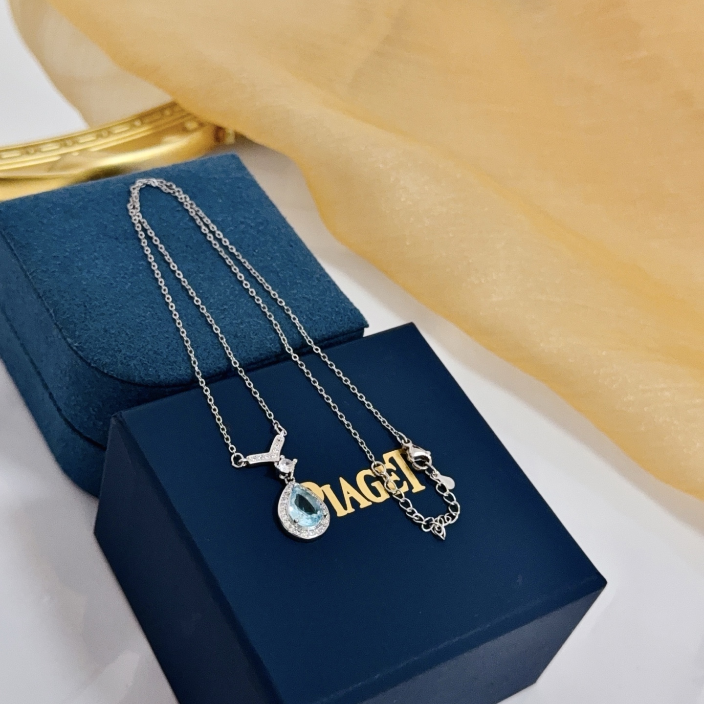 Piaget Treasures Teardrop Pendant necklace Silver-toned white gold metal sky blue teardrop gemstone clear diamond accents 42cm with 3cm extender