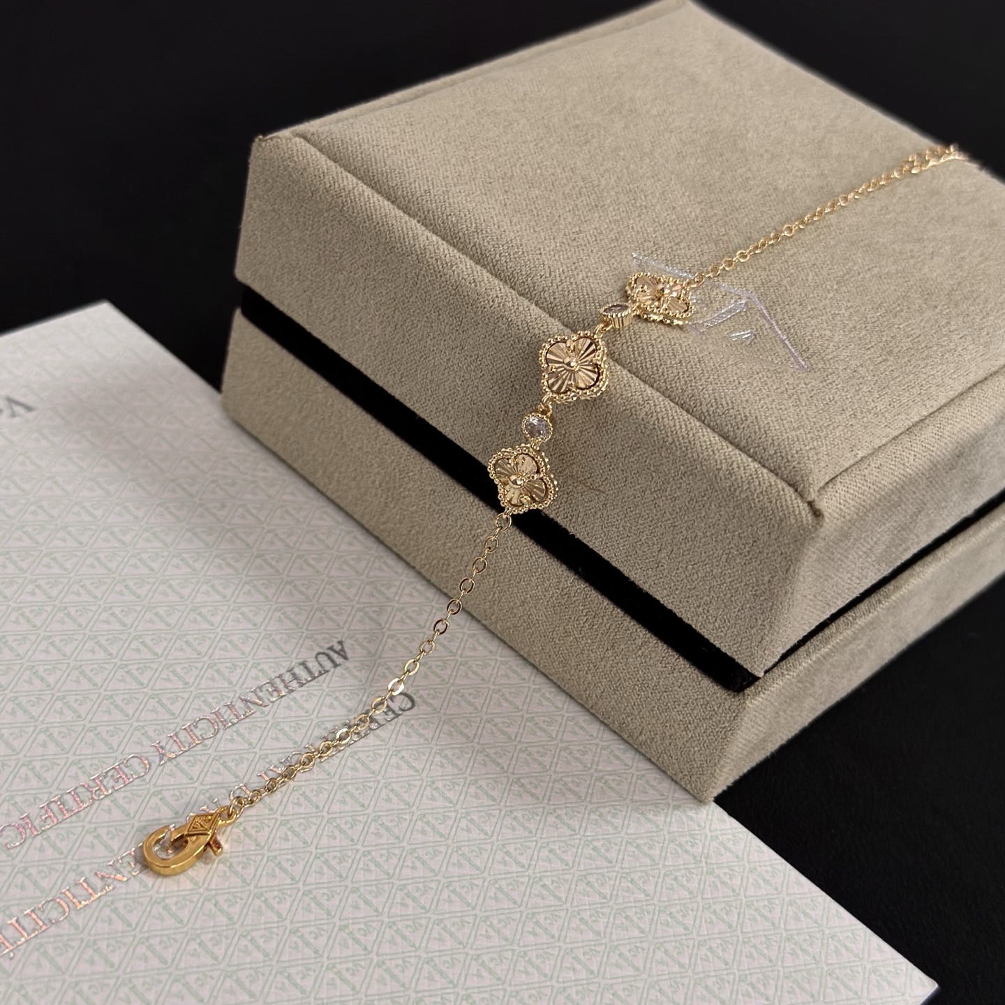 Van Cleef Arpels Alhambra bracelet yellow gold with clear accent stones 18cm with 3cm extender