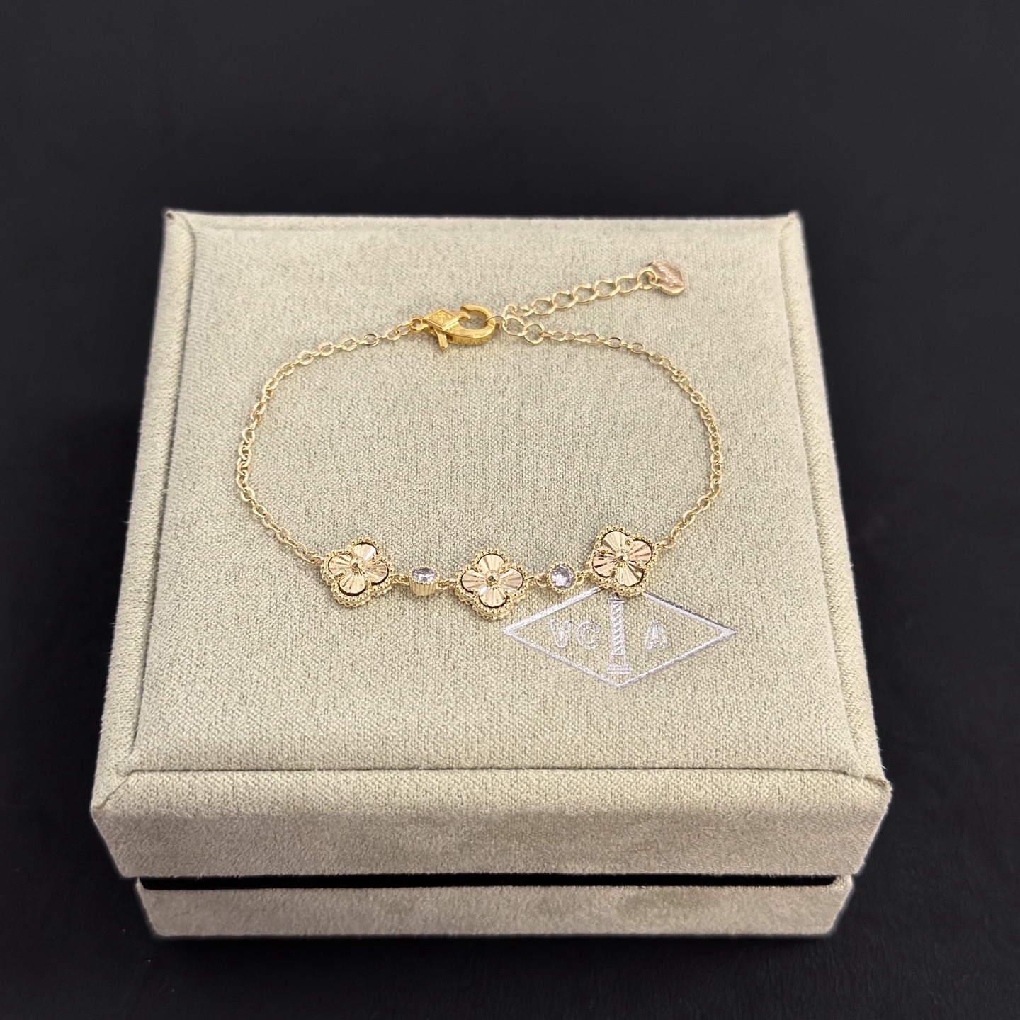 Van Cleef Arpels Alhambra bracelet yellow gold with clear accent stones 18cm with 3cm extender