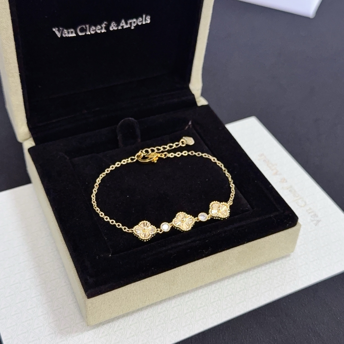 Van Cleef Arpels Alhambra bracelet yellow gold with clear accent stones 18cm with 3cm extender