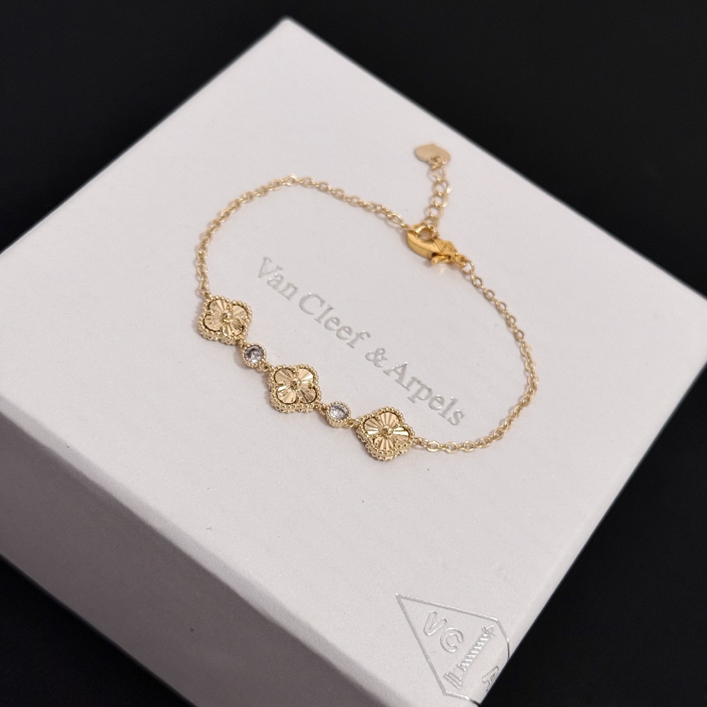 Van Cleef Arpels Alhambra bracelet yellow gold with clear accent stones 18cm with 3cm extender