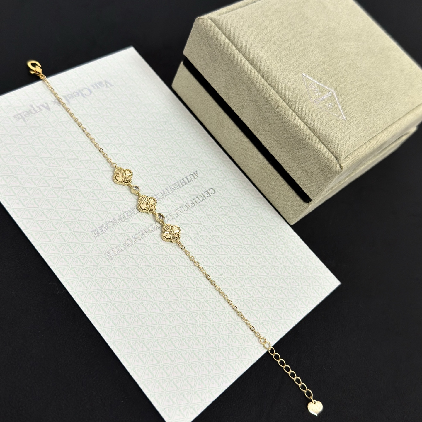 Van Cleef Arpels Alhambra bracelet yellow gold with clear accent stones 18cm with 3cm extender