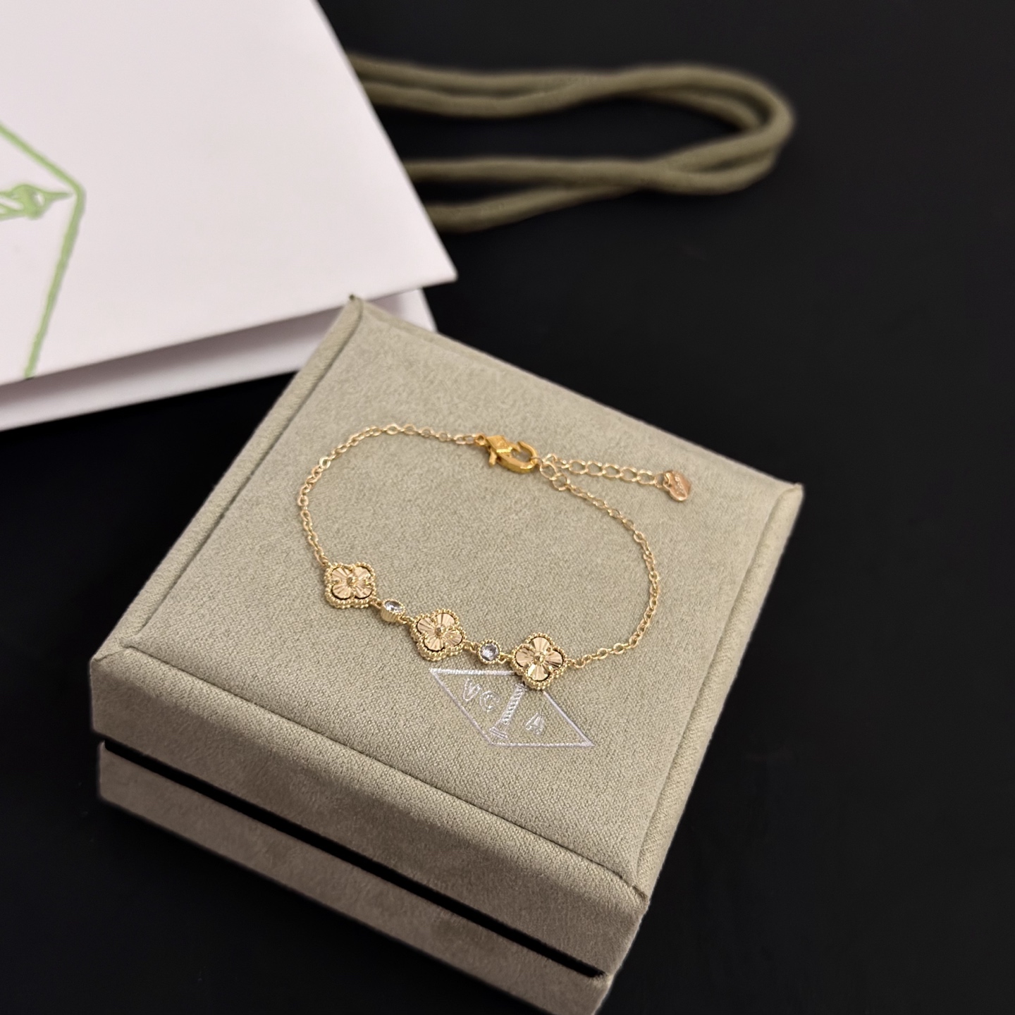 Van Cleef Arpels Alhambra bracelet yellow gold with clear accent stones 18cm with 3cm extender