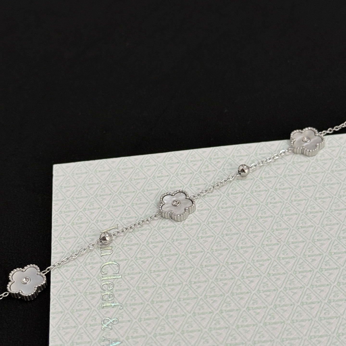 Van Cleef Arpels Alhambra bracelet silver-toned metal white mother-of-pearl clear diamond accents 17cm