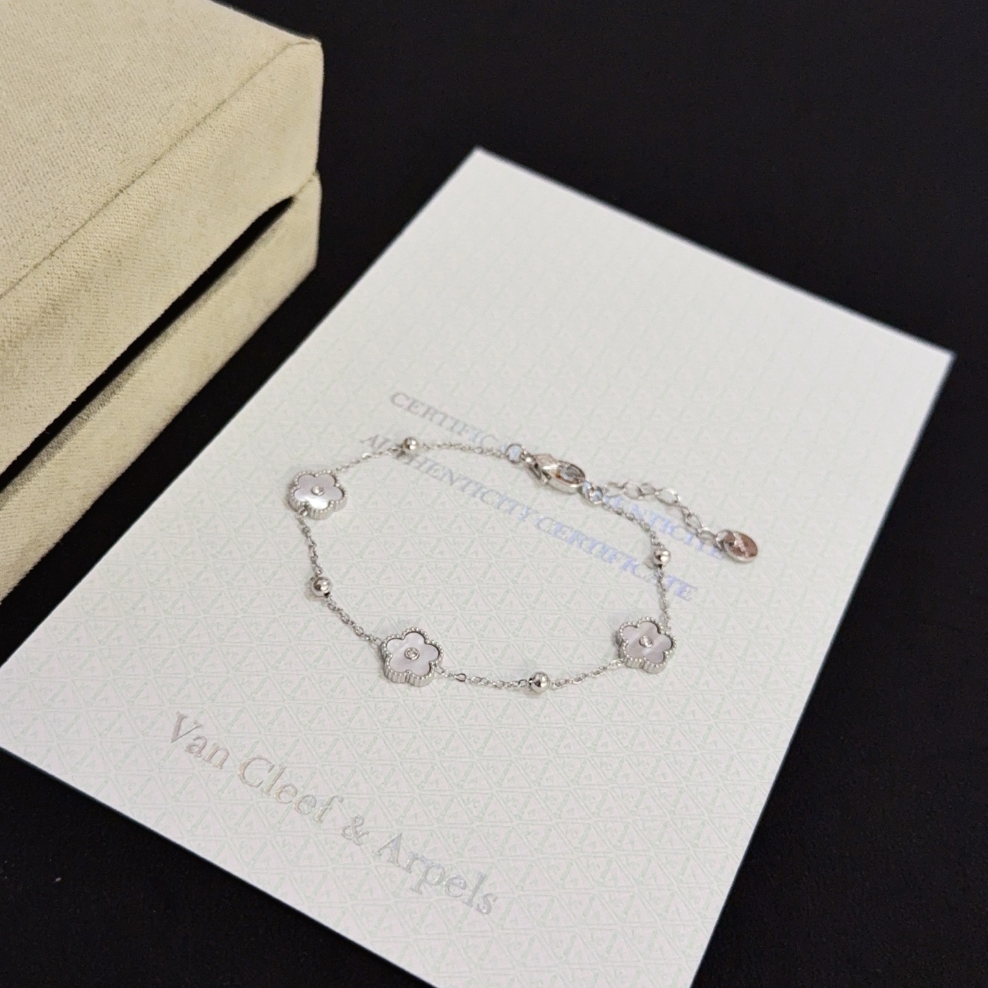 Van Cleef Arpels Alhambra bracelet silver-toned metal white mother-of-pearl clear diamond accents 17cm