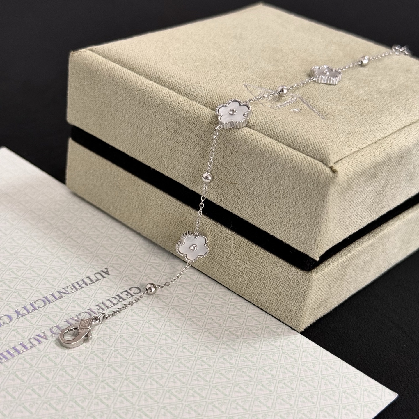 Van Cleef Arpels Alhambra bracelet silver-toned metal white mother-of-pearl clear diamond accents 17cm