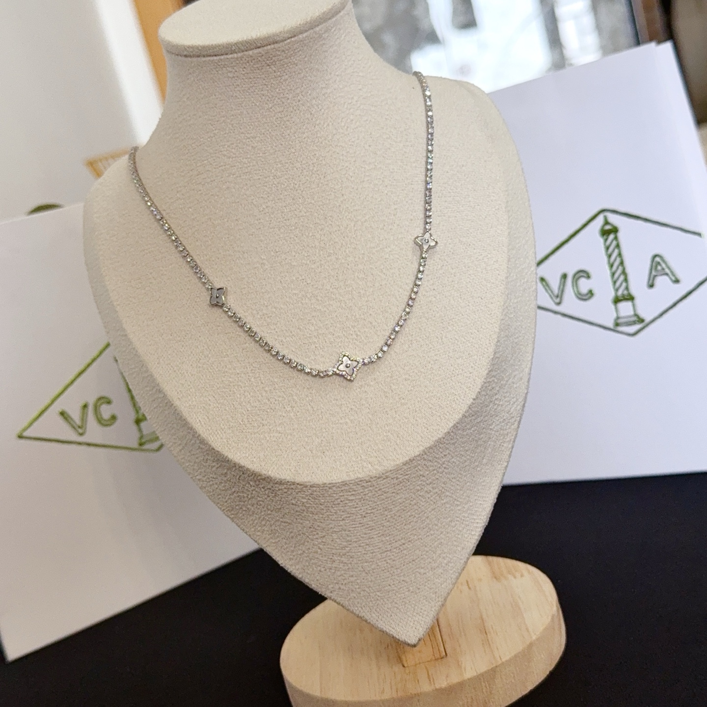 Van Cleef Arpels Alhambra necklace silver-toned white gold metal with clear diamond accents and mother-of-pearl clover motifs 42cm with 5cm extender chain