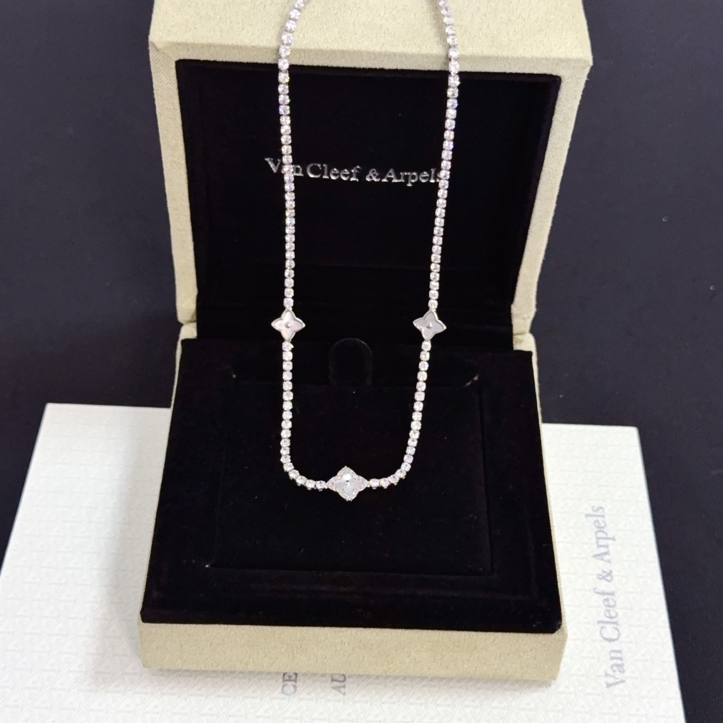Van Cleef Arpels Alhambra necklace silver-toned white gold metal with clear diamond accents and mother-of-pearl clover motifs 42cm with 5cm extender chain