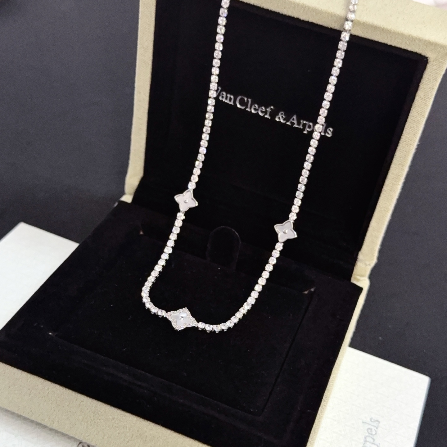 Van Cleef Arpels Alhambra necklace silver-toned white gold metal with clear diamond accents and mother-of-pearl clover motifs 42cm with 5cm extender chain