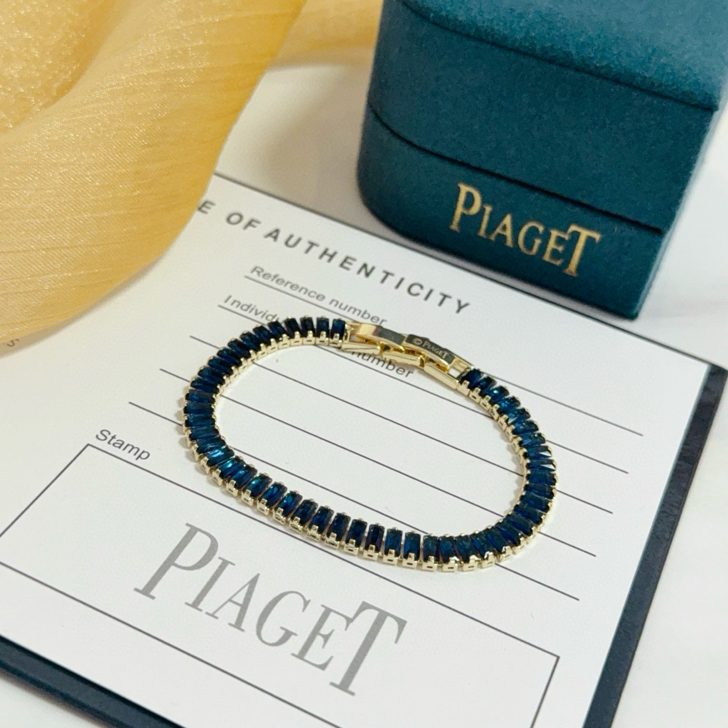 Piaget Tennis Line Bracelet bracelet Yellow gold with deep blue baguette-cut gemstones 18cm