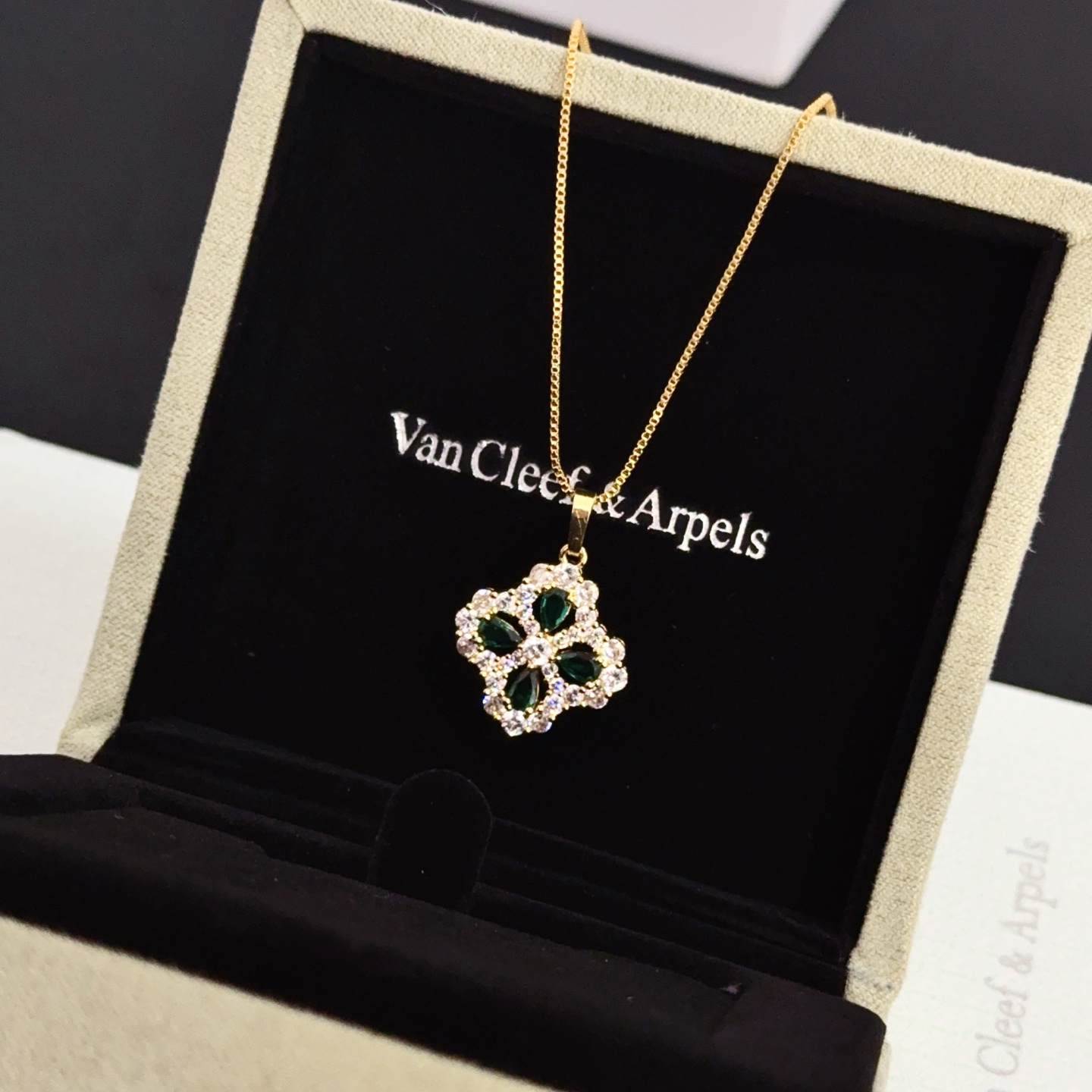 Van Cleef Arpels Alhambra necklace yellow gold metal with green gemstones and clear diamond accents 42cm