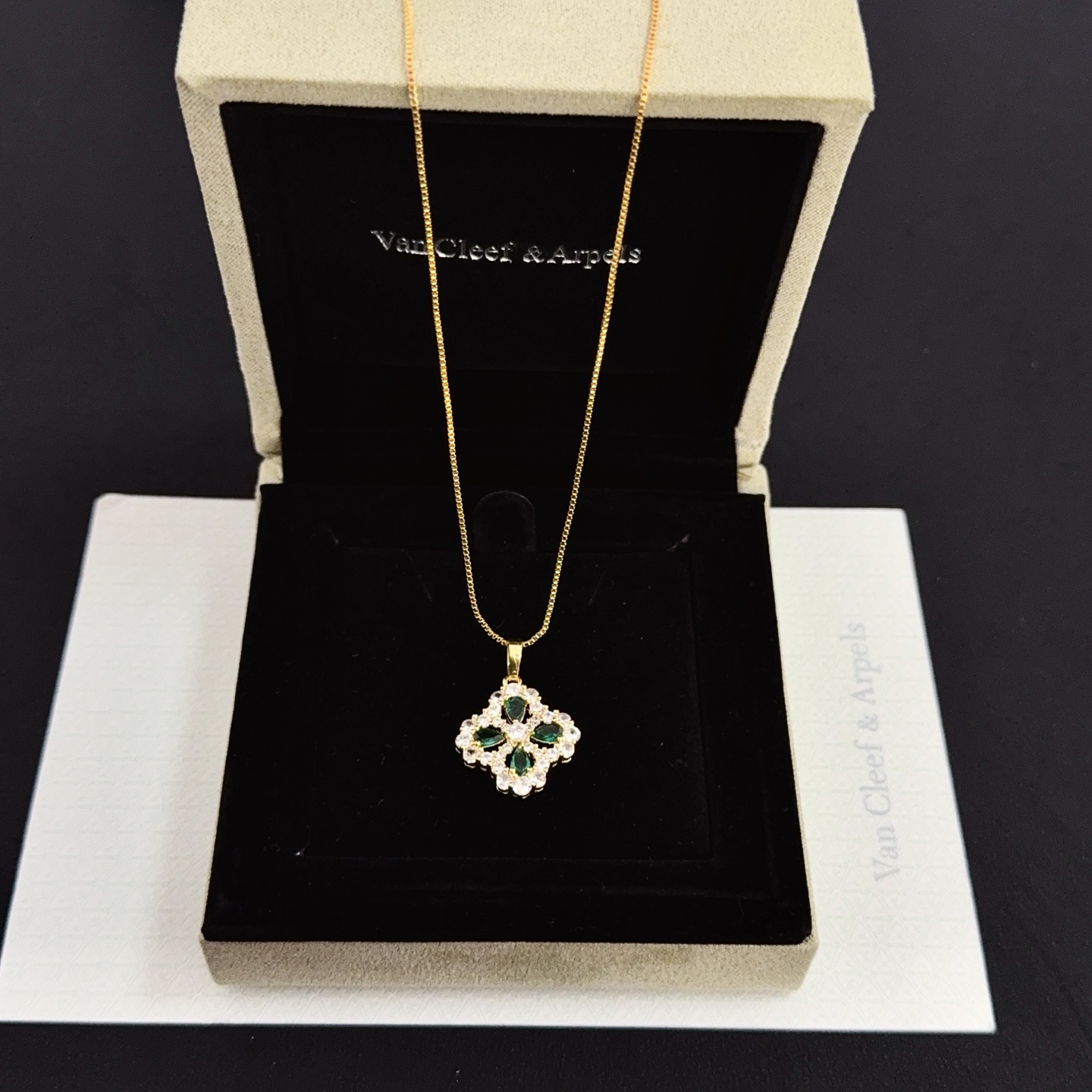 Van Cleef Arpels Alhambra necklace yellow gold metal with green gemstones and clear diamond accents 42cm