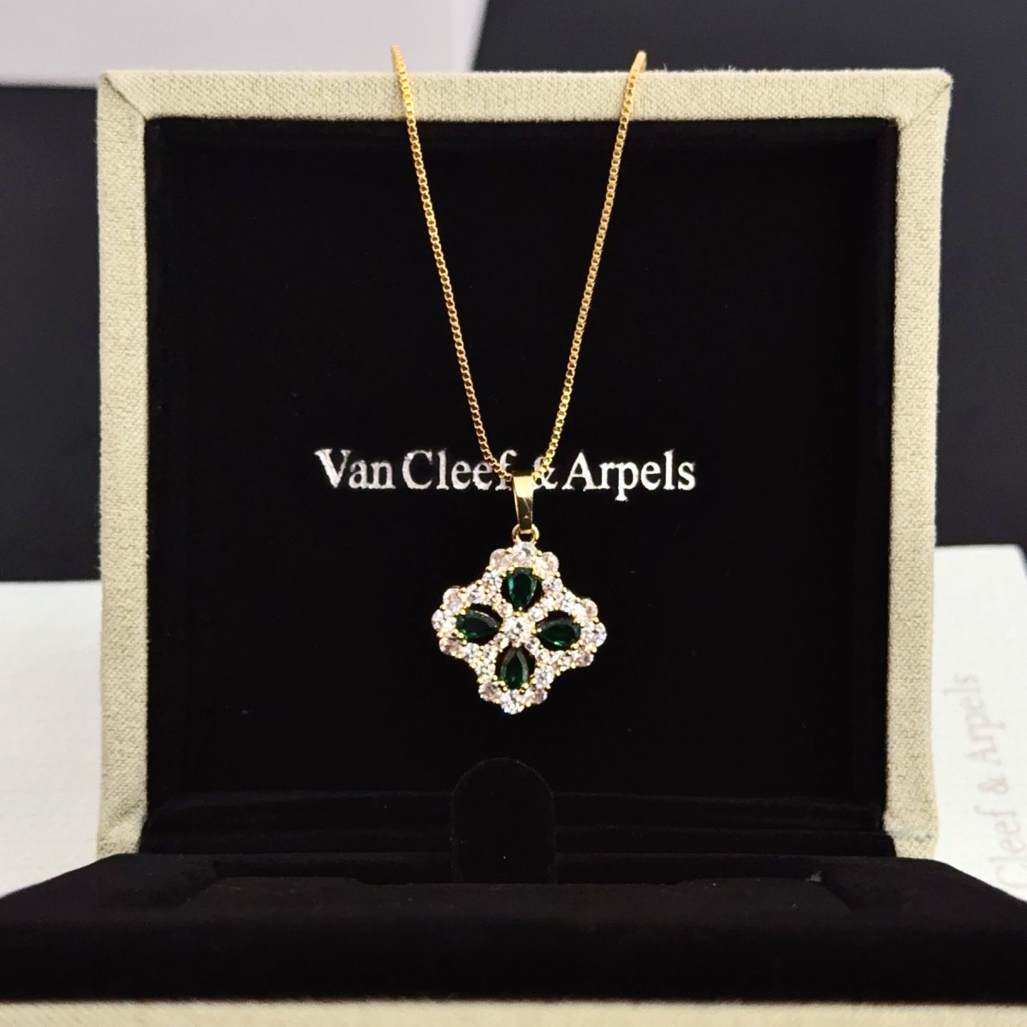 Van Cleef Arpels Alhambra necklace yellow gold metal with green gemstones and clear diamond accents 42cm
