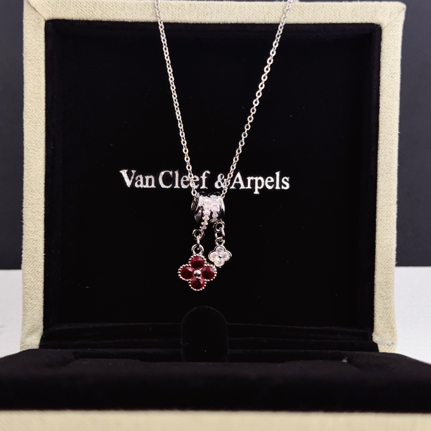 Van Cleef Arpels Alhambra Lucky Charms Pendant Necklace necklace silver-toned white gold with white diamonds and ruby red gemstones 42cm