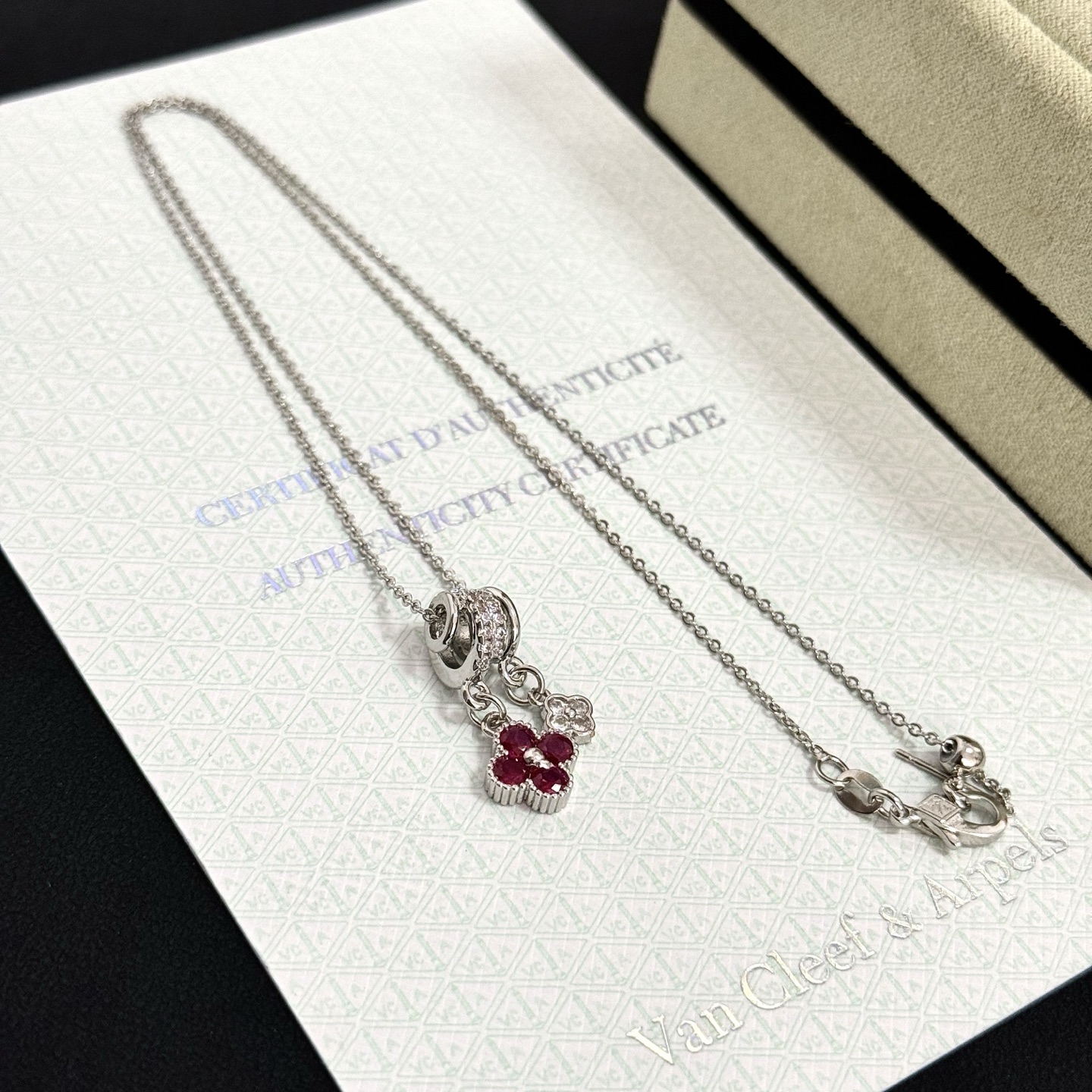 Van Cleef Arpels Alhambra Lucky Charms Pendant Necklace necklace silver-toned white gold with white diamonds and ruby red gemstones 42cm
