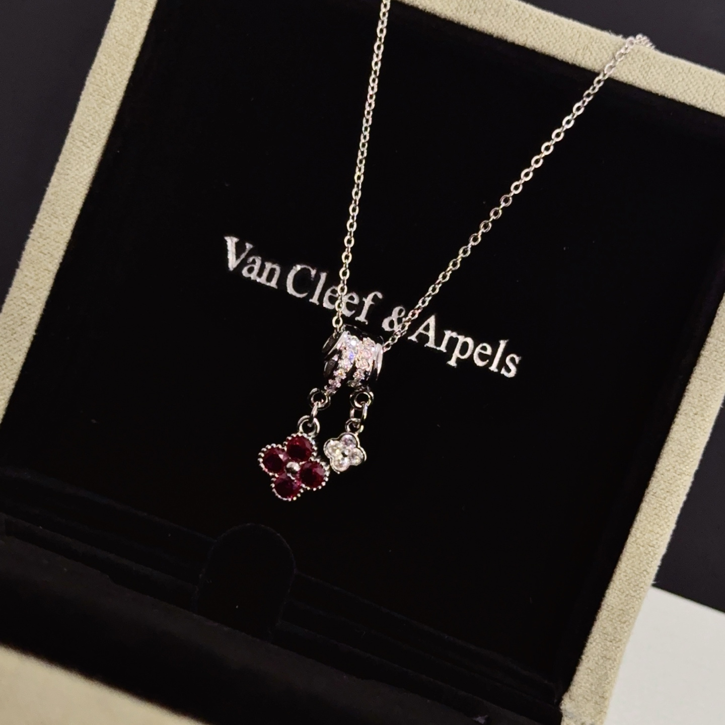 Van Cleef Arpels Alhambra Lucky Charms Pendant Necklace necklace silver-toned white gold with white diamonds and ruby red gemstones 42cm