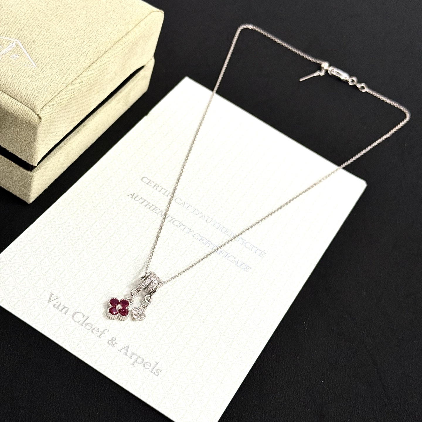Van Cleef Arpels Alhambra Lucky Charms Pendant Necklace necklace silver-toned white gold with white diamonds and ruby red gemstones 42cm