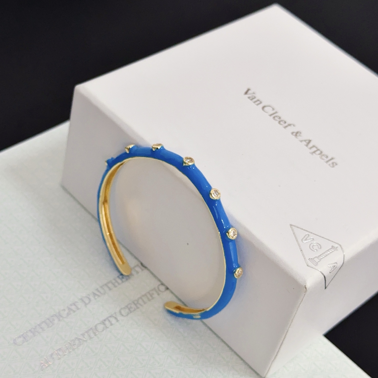 Van Cleef Arpels Perlee bracelet Yellow gold with blue enamel and clear diamond accents 17cm