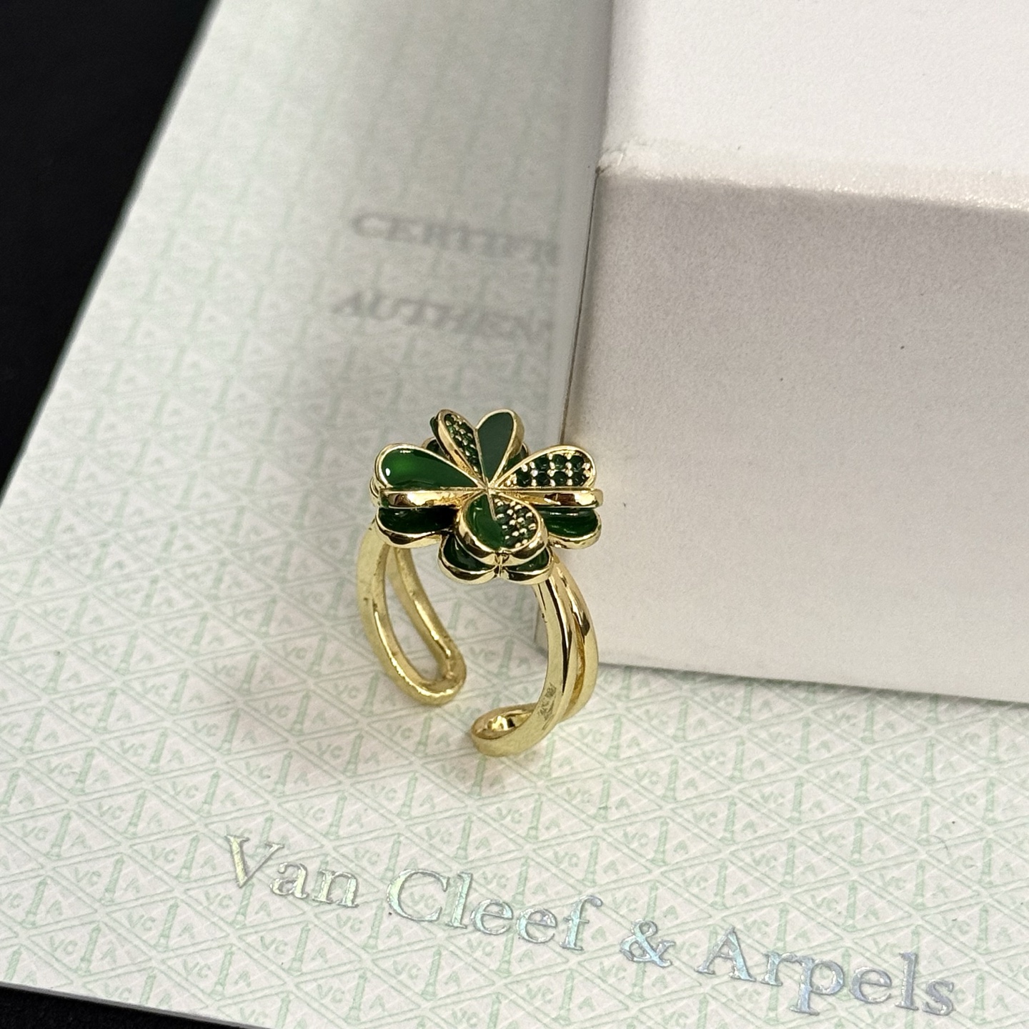 Van Cleef Arpels Cosmos Four-Leaf Clover ring yellow gold metal with green enamel and green pave stones adjustable open band