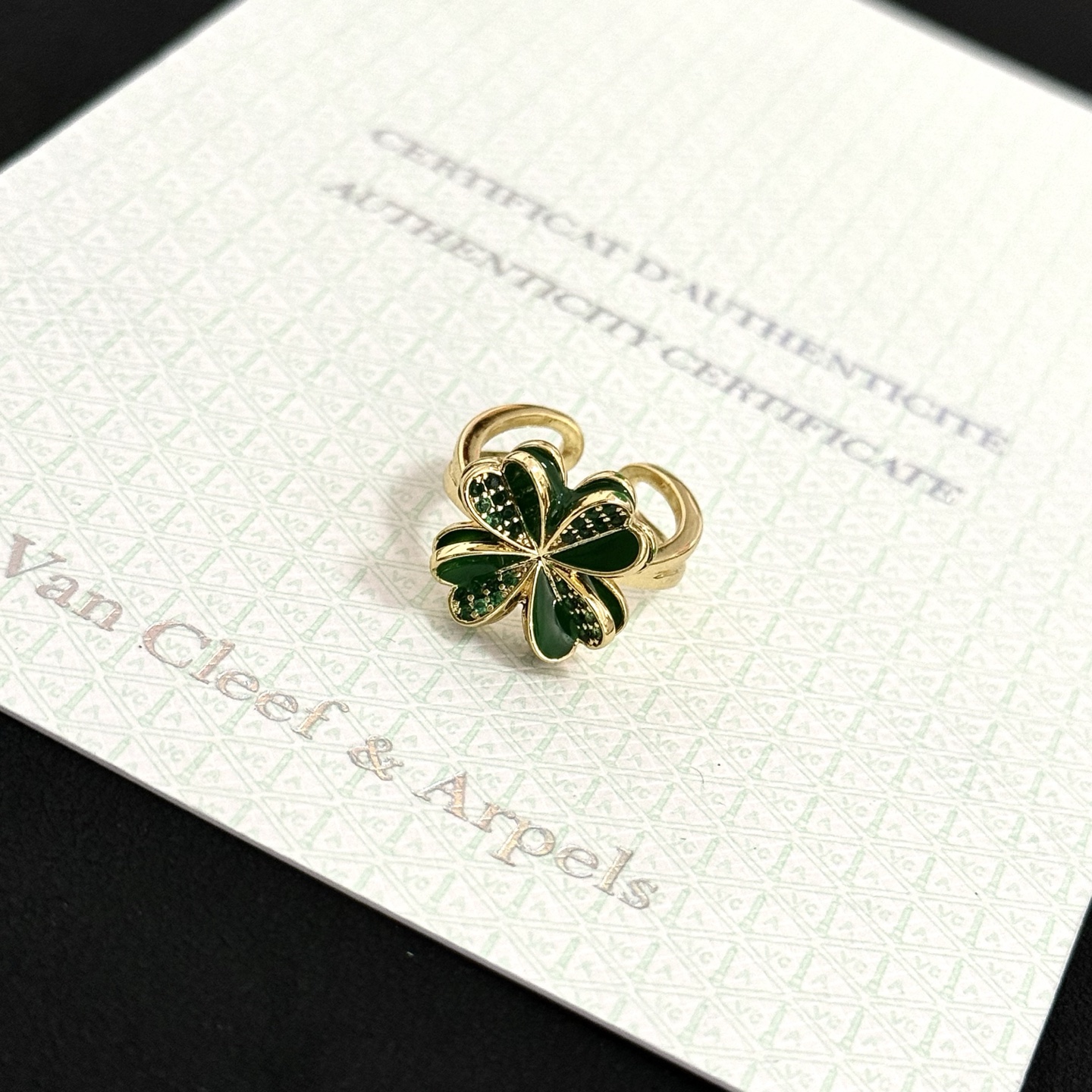 Van Cleef Arpels Cosmos Four-Leaf Clover ring yellow gold metal with green enamel and green pave stones adjustable open band
