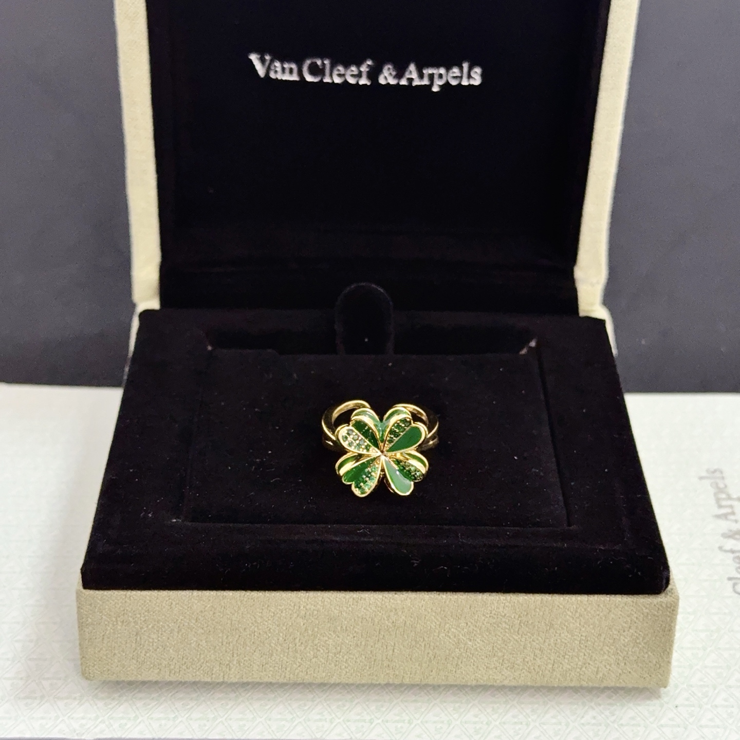 Van Cleef Arpels Cosmos Four-Leaf Clover ring yellow gold metal with green enamel and green pave stones adjustable open band