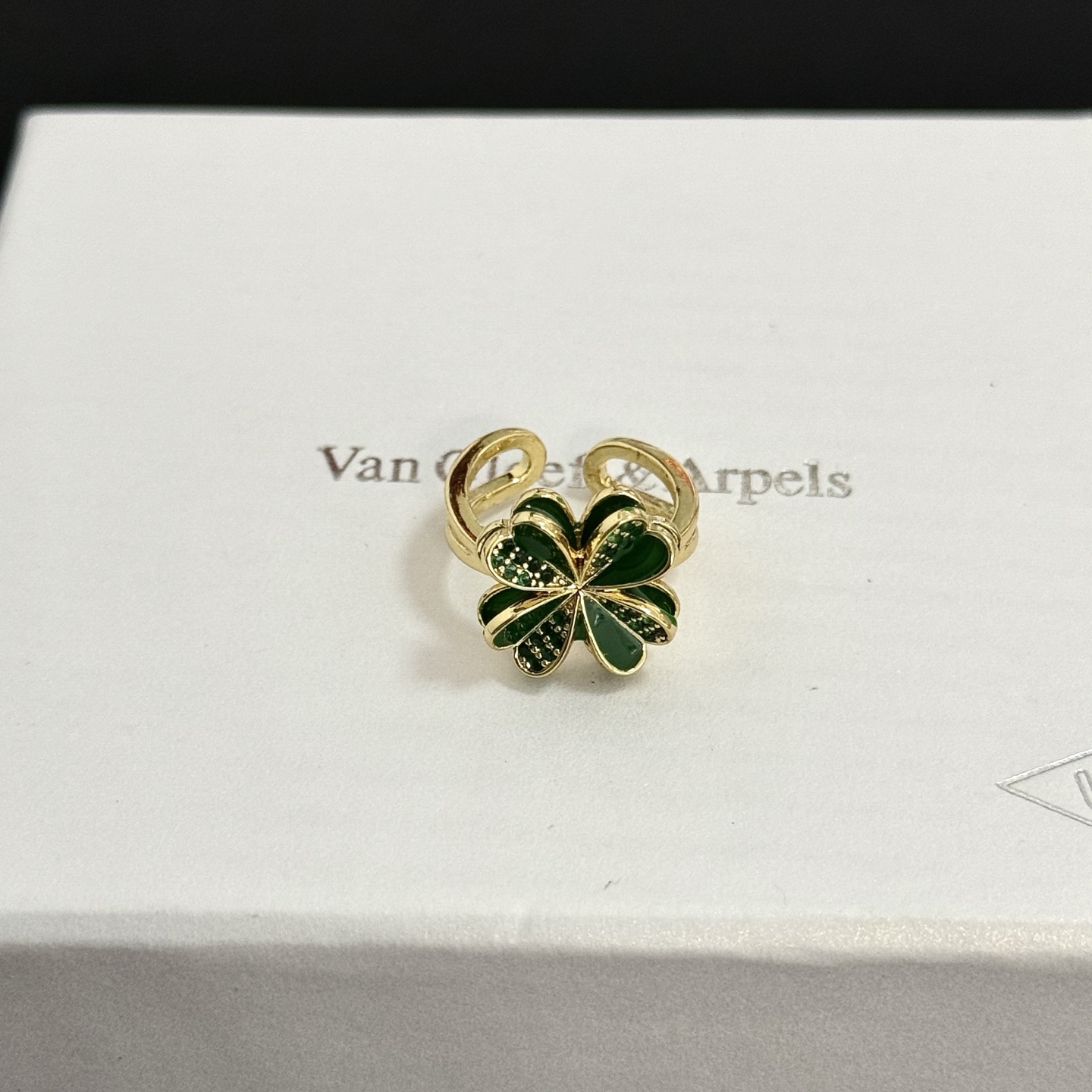 Van Cleef Arpels Cosmos Four-Leaf Clover ring yellow gold metal with green enamel and green pave stones adjustable open band