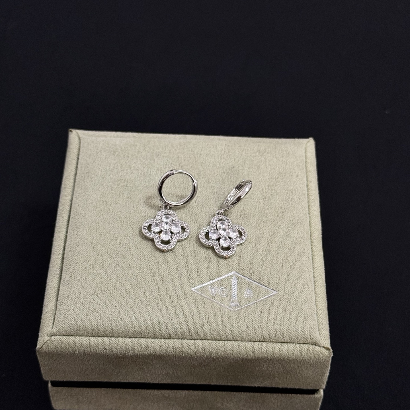 Van Cleef Arpels Alhambra earrings silver-toned white gold metal clear diamond-like gemstones 12mm hoop diameter 10mm charm