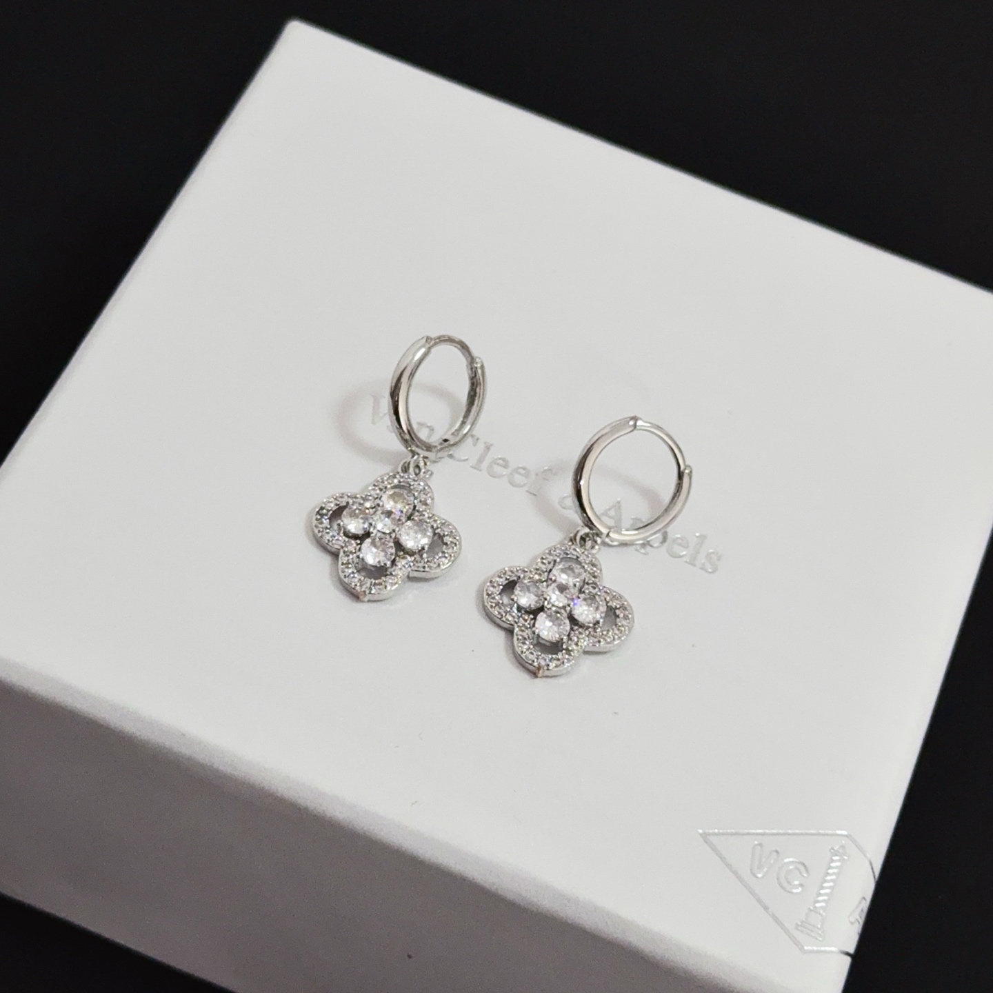 Van Cleef Arpels Alhambra earrings silver-toned white gold metal clear diamond-like gemstones 12mm hoop diameter 10mm charm