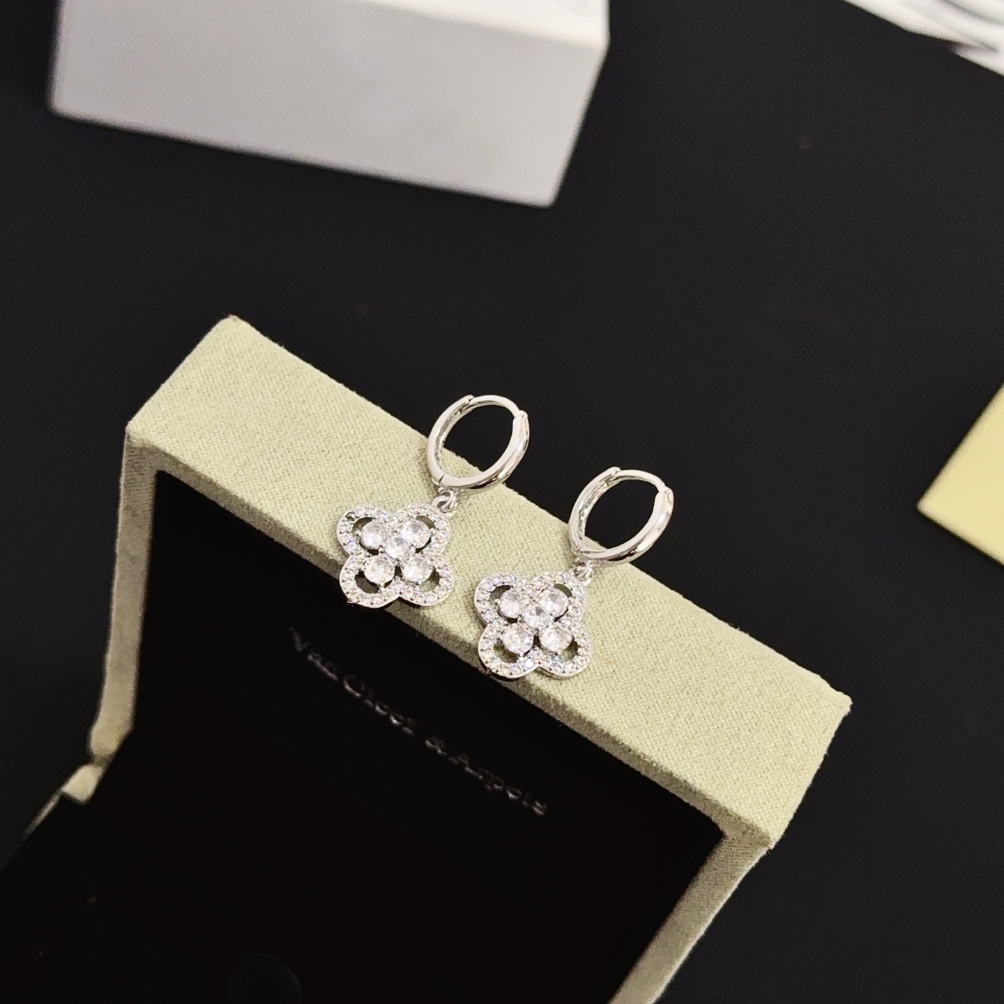 Van Cleef Arpels Alhambra earrings silver-toned white gold metal clear diamond-like gemstones 12mm hoop diameter 10mm charm