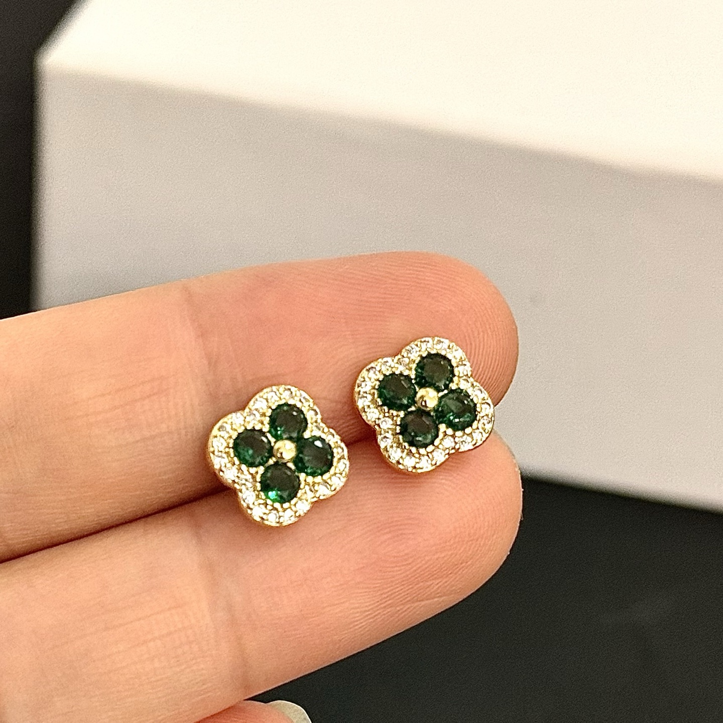 Van Cleef Arpels Alhambra earrings yellow gold metal with emerald green gemstones and white diamond accents 9mm stud diameter