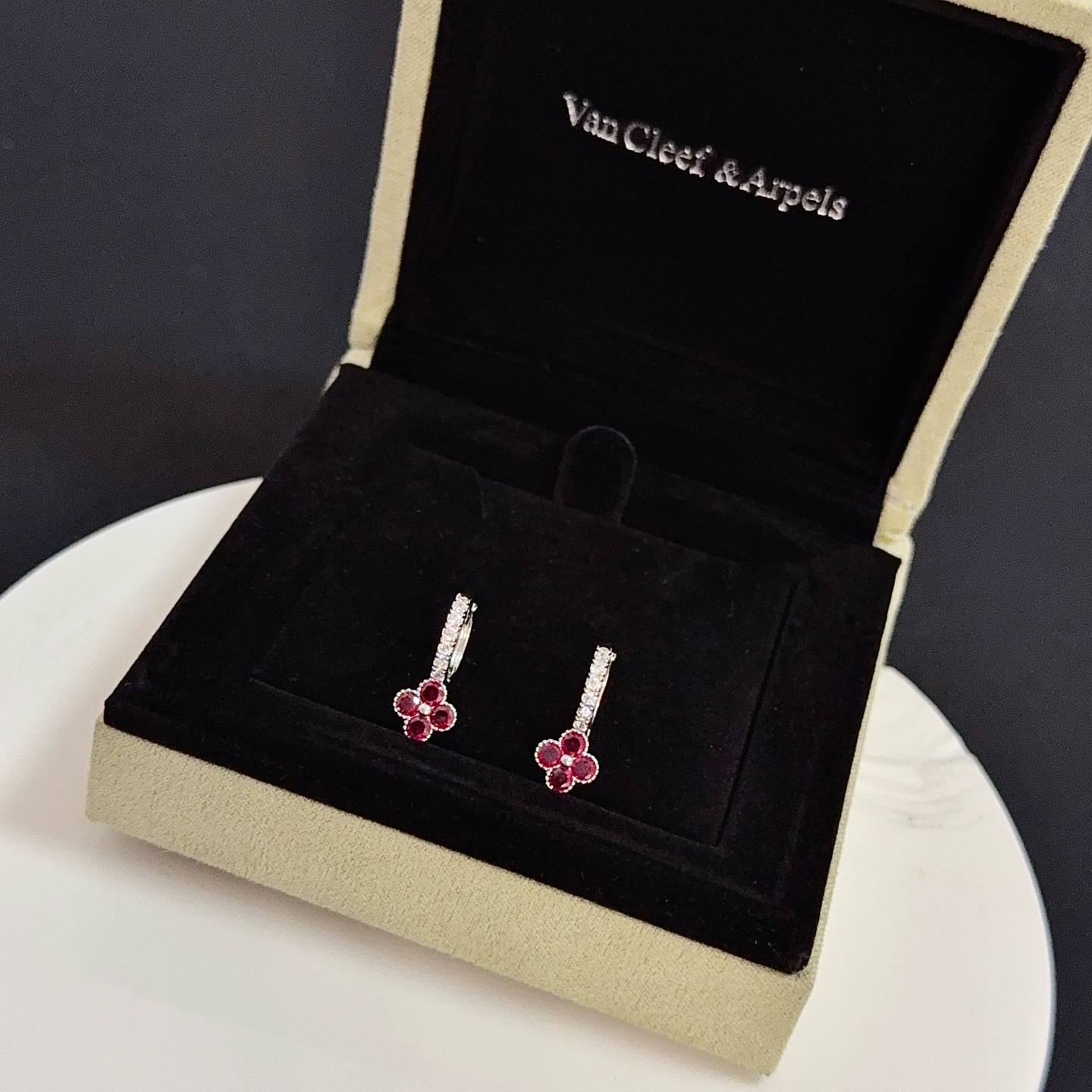 Van Cleef Arpels Alhambra earrings silver-toned white gold with clear diamonds and ruby-red four-leaf clover stones 1 5cm hoop diameter