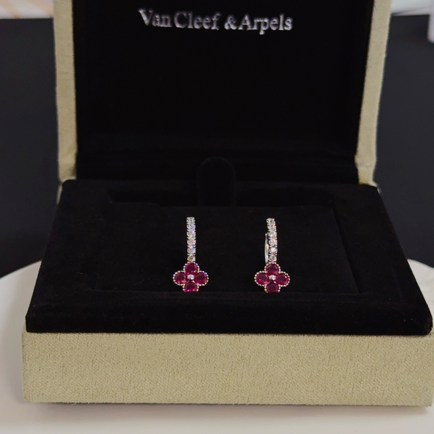 Van Cleef Arpels Alhambra earrings silver-toned white gold with clear diamonds and ruby-red four-leaf clover stones 1 5cm hoop diameter