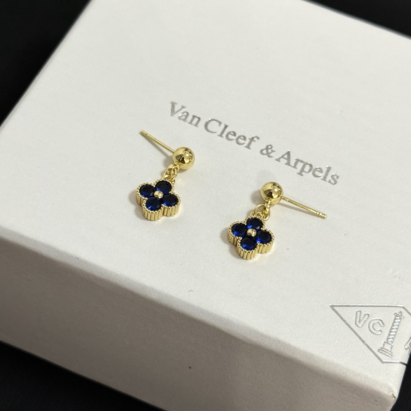 Van Cleef Arpels Alhambra earrings yellow gold metal with deep blue gemstones 1 5cm drop length