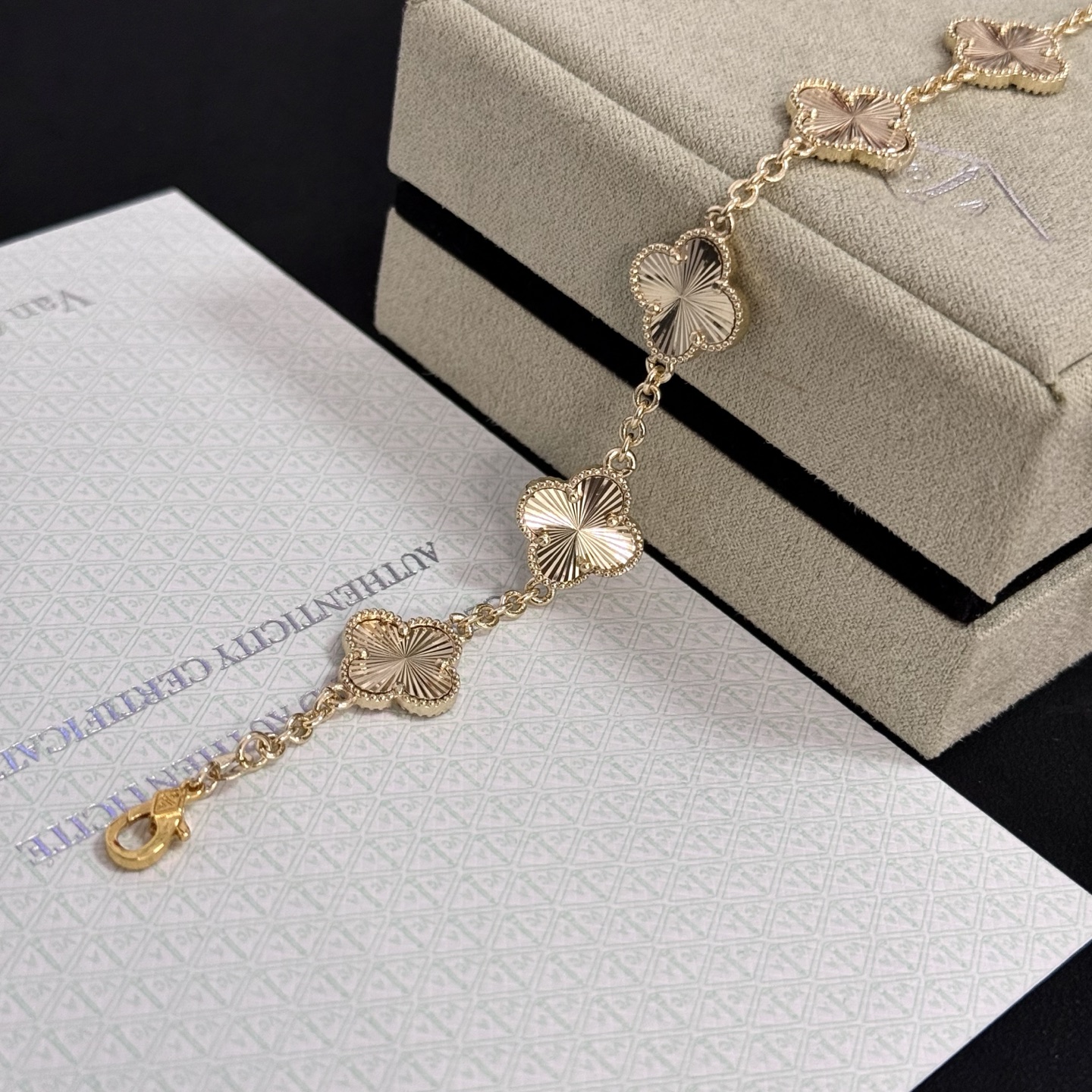 Van Cleef Arpels Alhambra bracelet gold tone metal with guilloche gold clover motifs 19cm
