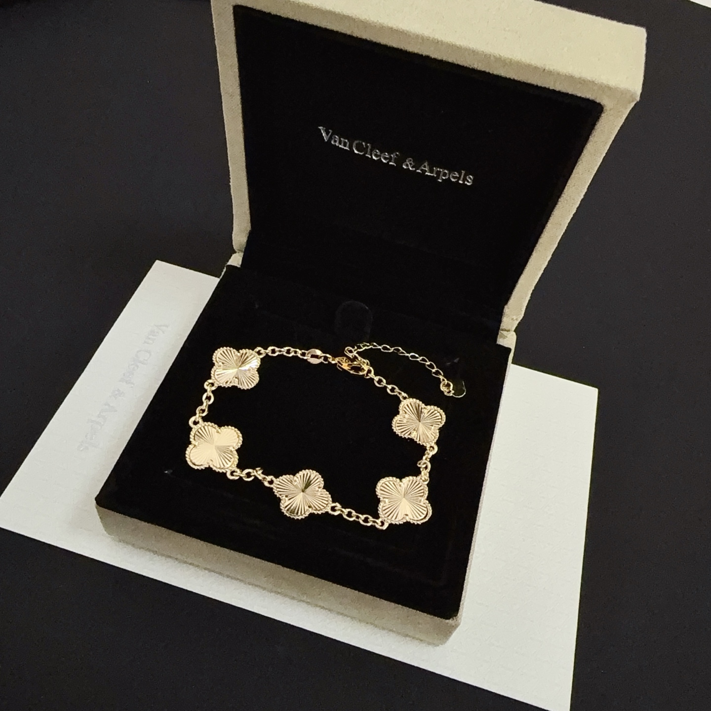 Van Cleef Arpels Alhambra bracelet gold tone metal with guilloche gold clover motifs 19cm