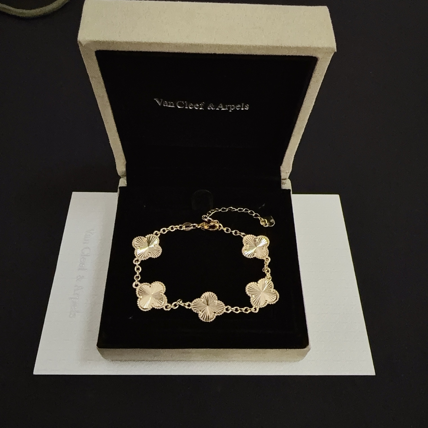 Van Cleef Arpels Alhambra bracelet gold tone metal with guilloche gold clover motifs 19cm