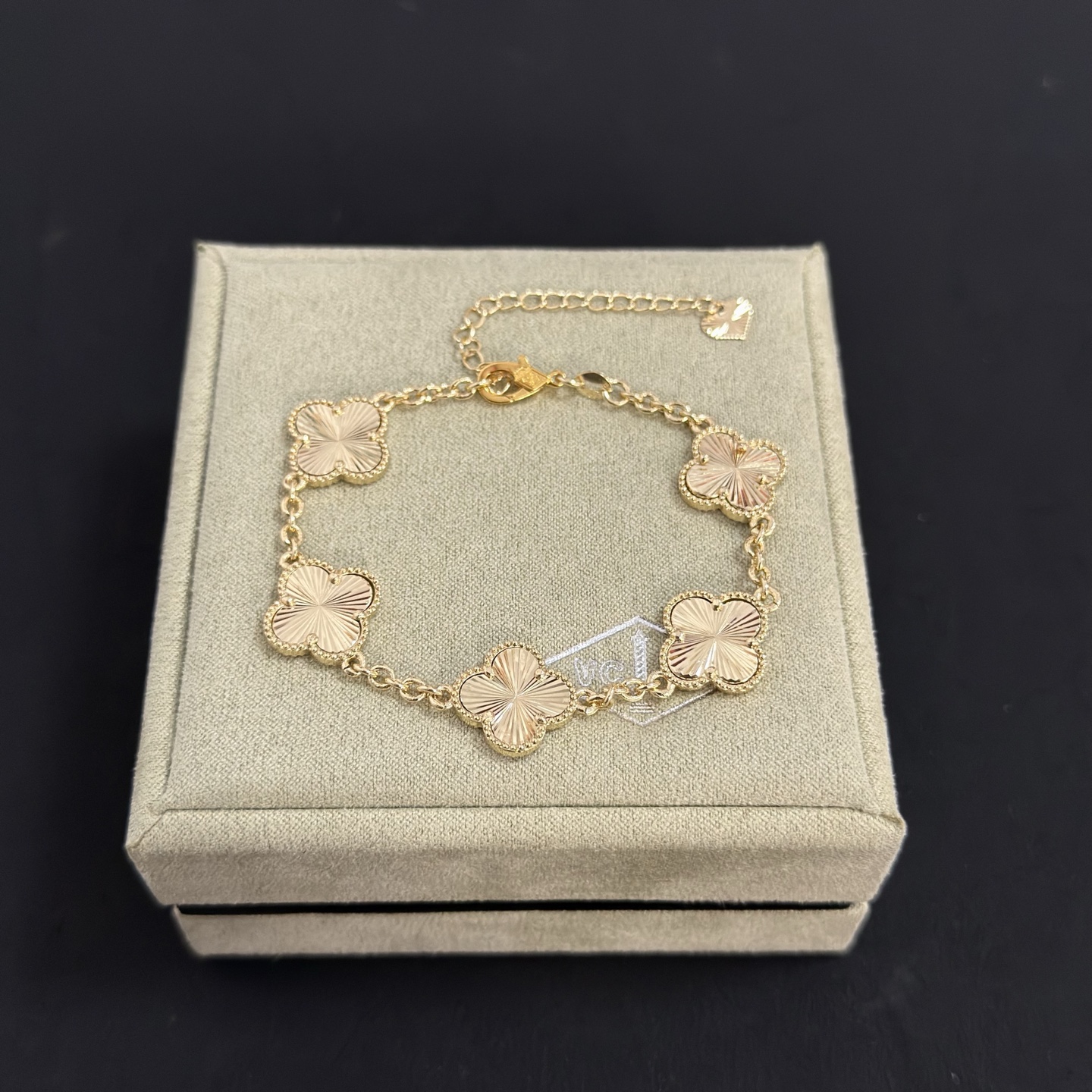 Van Cleef Arpels Alhambra bracelet gold tone metal with guilloche gold clover motifs 19cm
