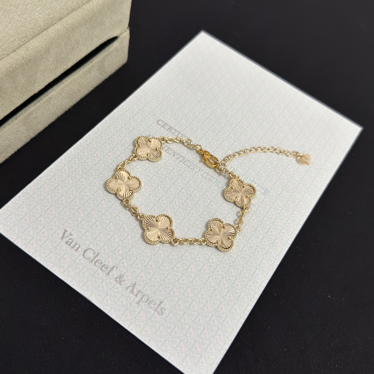 Van Cleef Arpels Alhambra bracelet gold tone metal with guilloche gold clover motifs 19cm