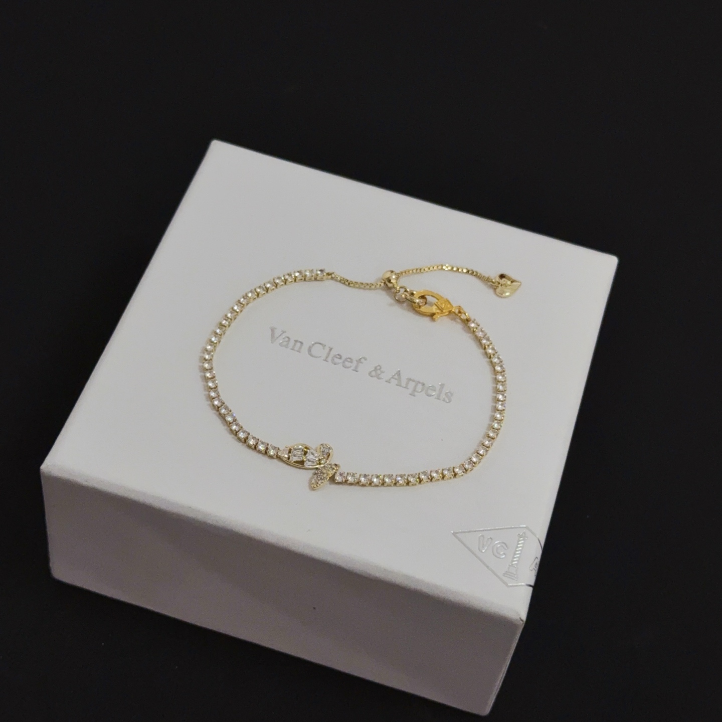 Van Cleef Arpels Alhambra bracelet gold-tone metal with clear diamond-like stones 18cm